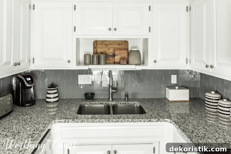 Transform Your Kitchen Without Remodeling: Before and After 12 A grey backsplash in the kitchen.