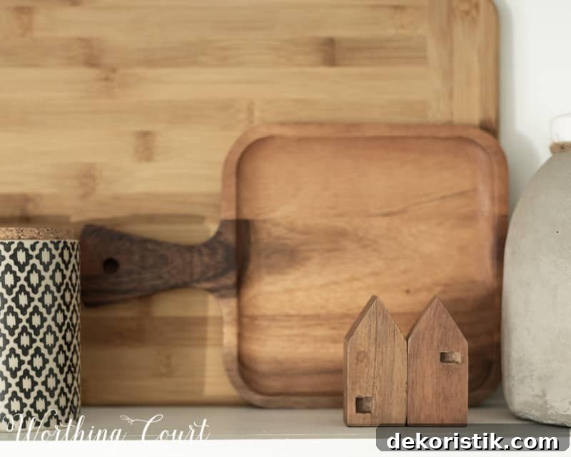 Transform Your Kitchen Without Remodeling: Before and After 13 A wooden cutting board on the kitchen counter.