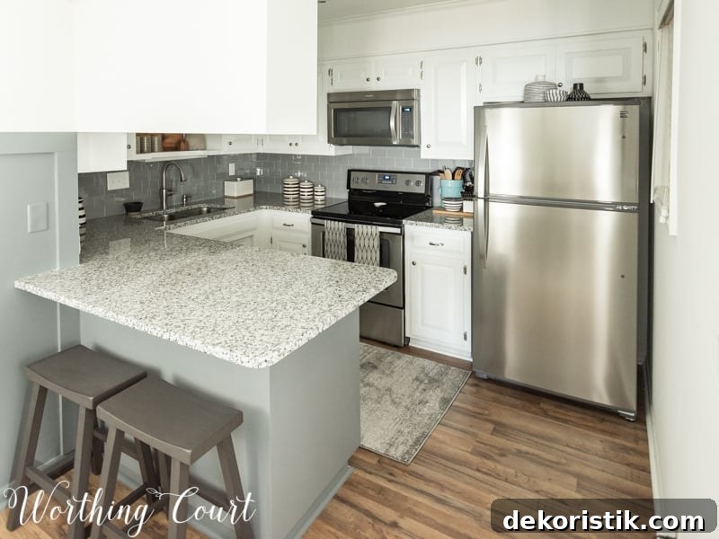 Transform Your Kitchen Without Remodeling: Before and After 5 The same kitchen with white cabinets and counters.