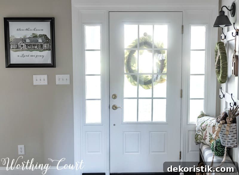 DIY watercolor art using an iphone hanging framed in the foyer.