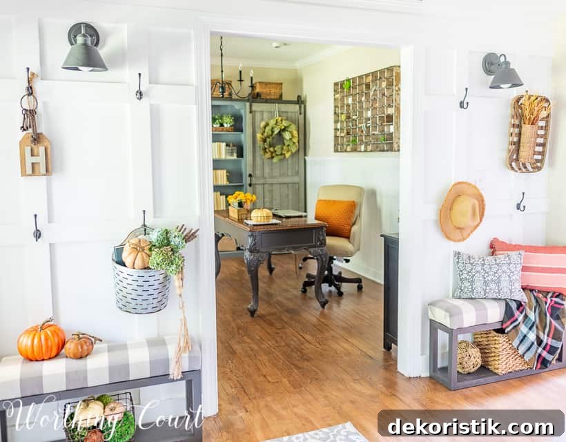 Minimal Fall Foyer Decor Ideas for a Welcoming Entry 6 White board and battten wall with fall decorations.