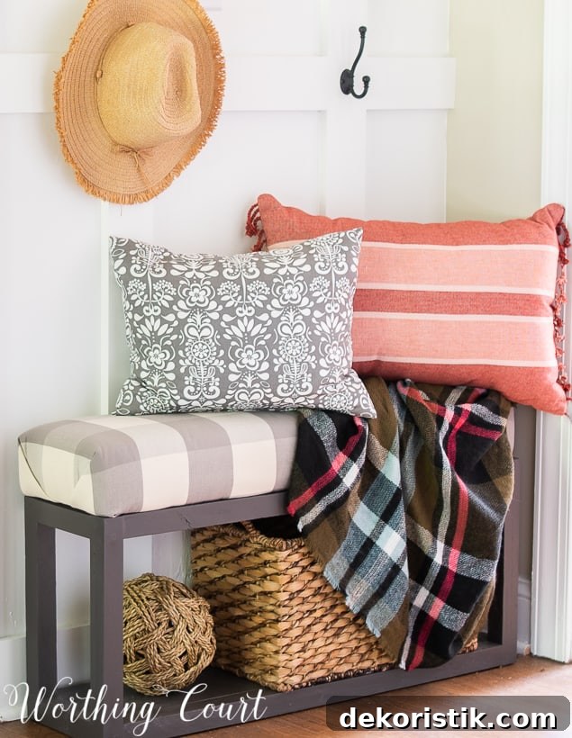 Minimal Fall Foyer Decor Ideas for a Welcoming Entry 10 Bench with fall pillows and plaid fall throw blanket.