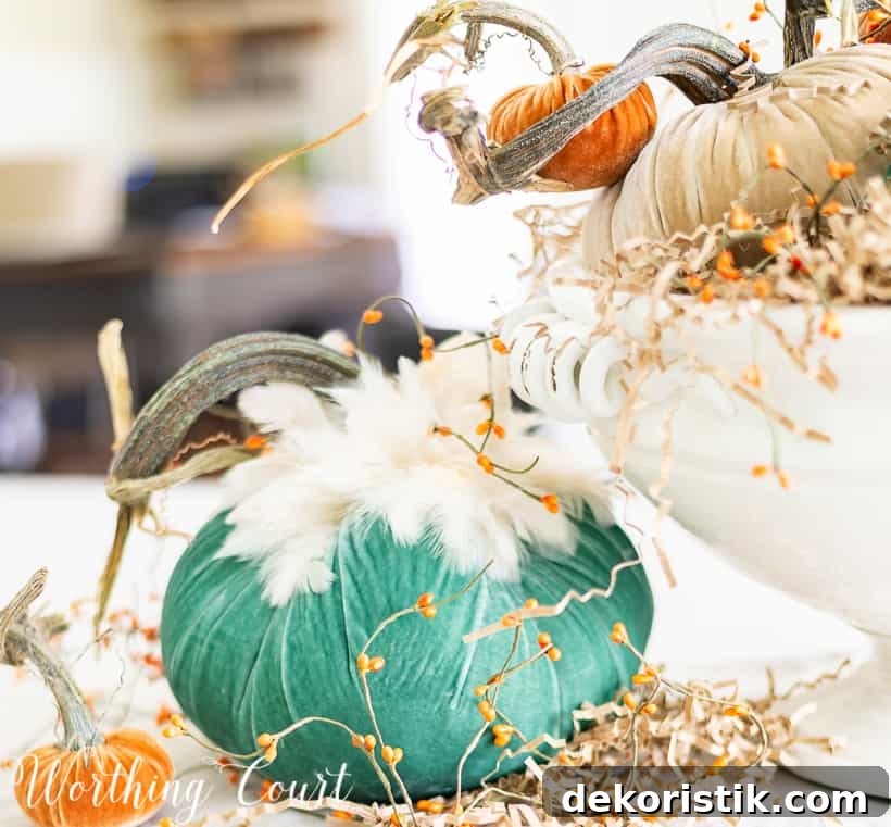 The pumpkins with the real looking stems, on the table as a fall centerpiece.