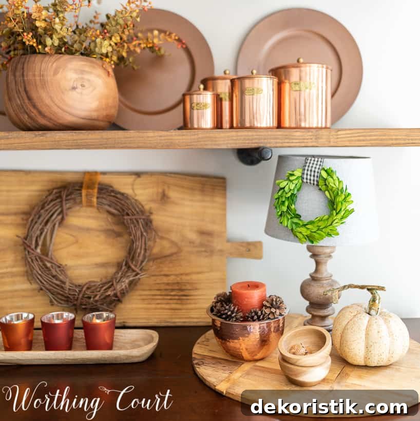 Brass canisters and Moscow mule cups are on the open shelves.