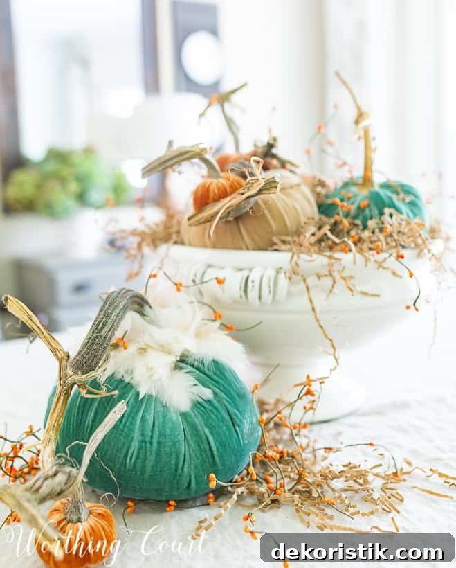 fall centerpiece with velvet pumpkins