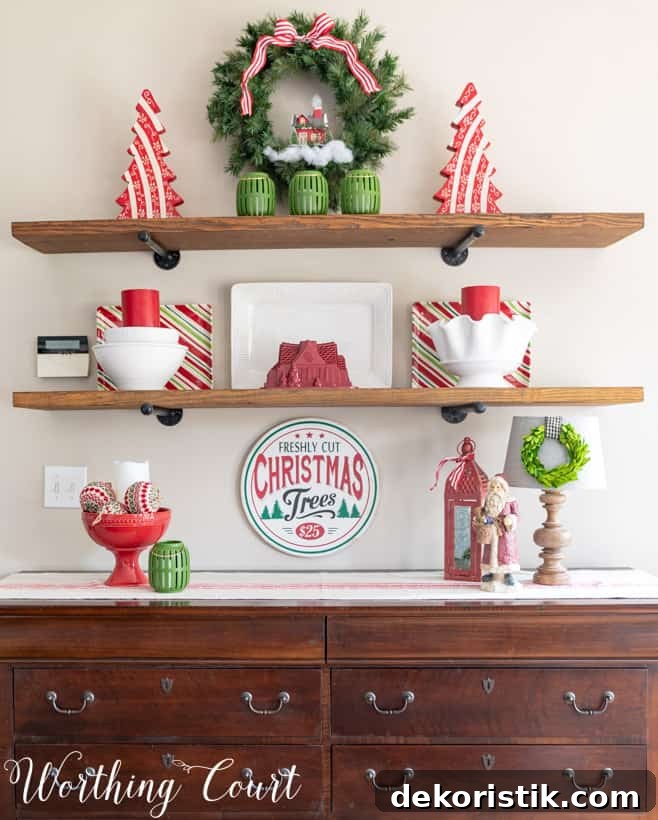 Open shelving with Christmas decor on it.