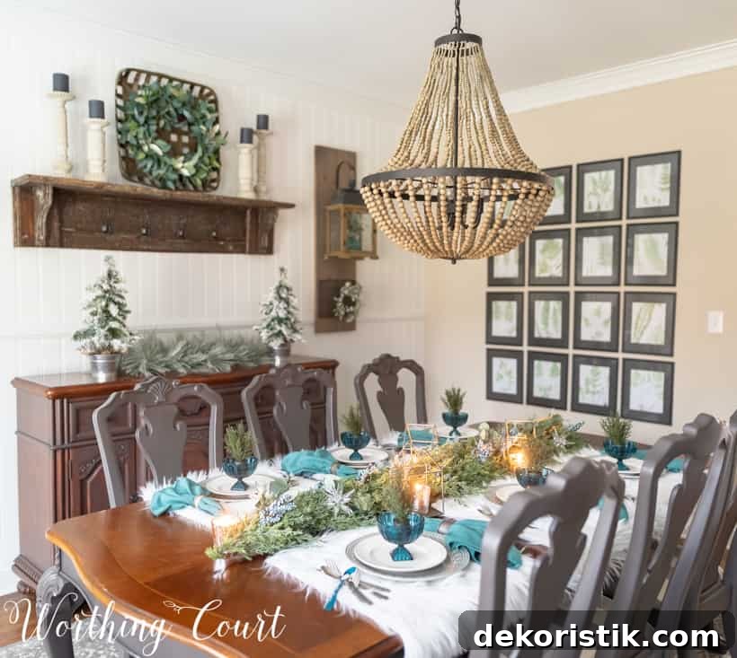 There ins a fresh evergreen garland on the table.