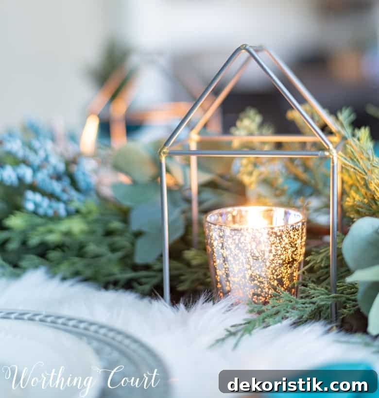 Mercury glass candle votive in a lantern.