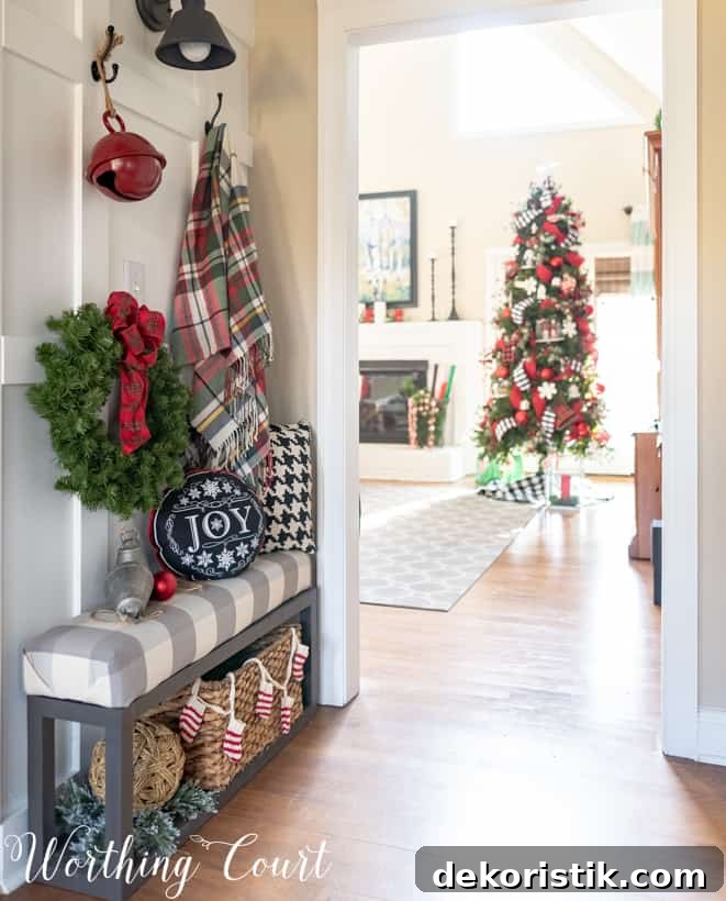 A small bench at the entrance with a wreath on the wall.