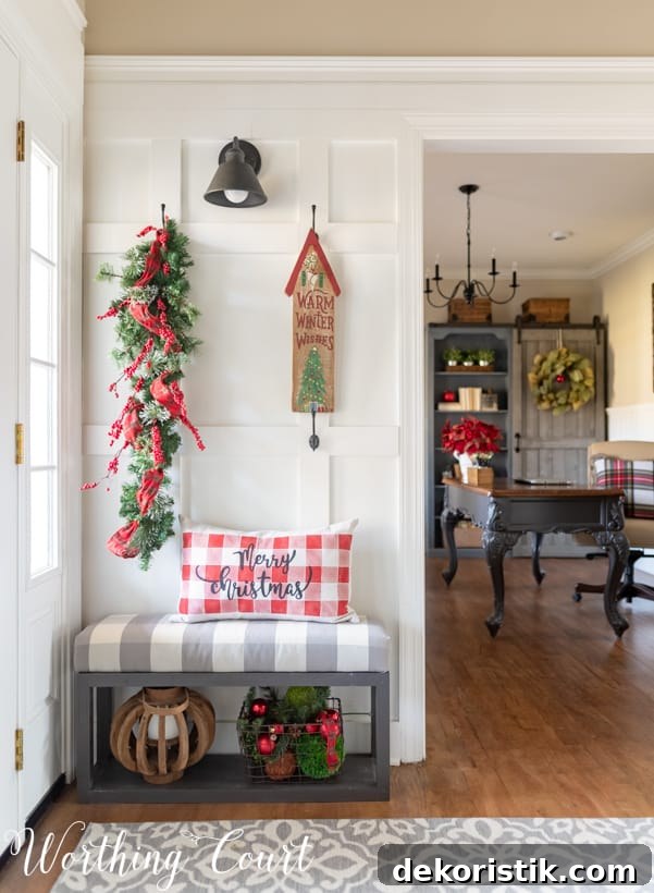 Red and green decorations are in the foyer.