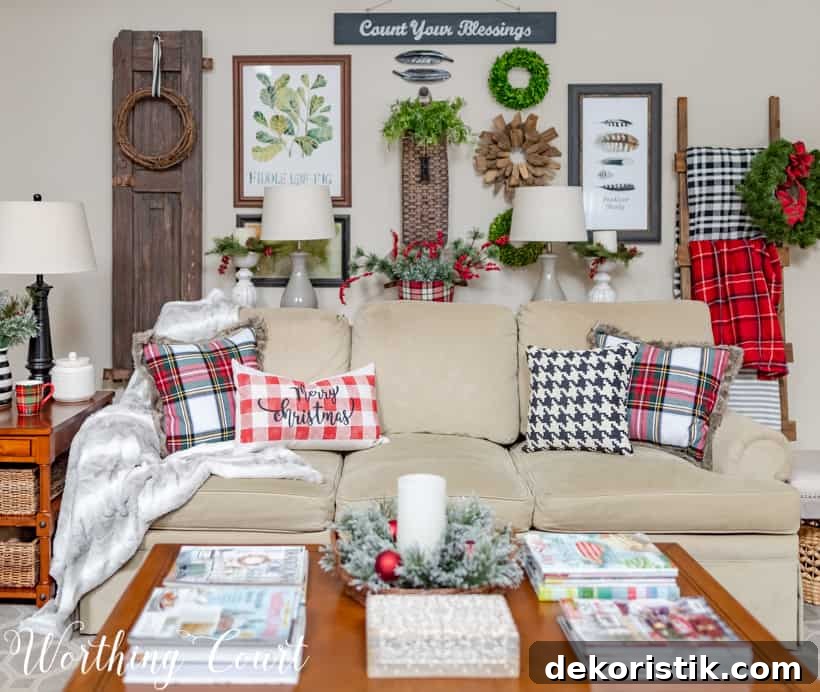Neutral sofa with plaid Christmas pillows.