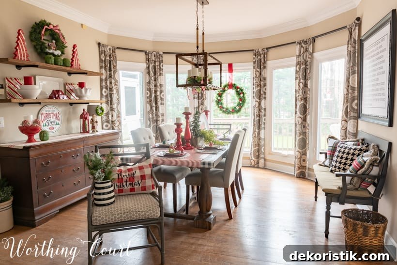 Festive Christmas tablescape with red, green and white in the dining room.