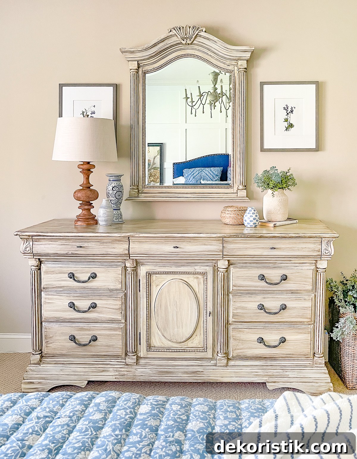 cottage style budget bedroom makeover with a navy blue upholstered headboard, board and batten feature wall, diy painted furniture and cottage style accessories