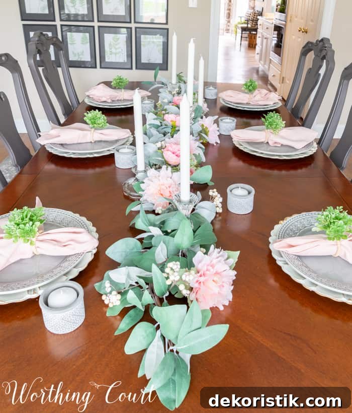 Dining room table with eucalyptus centerpiece.