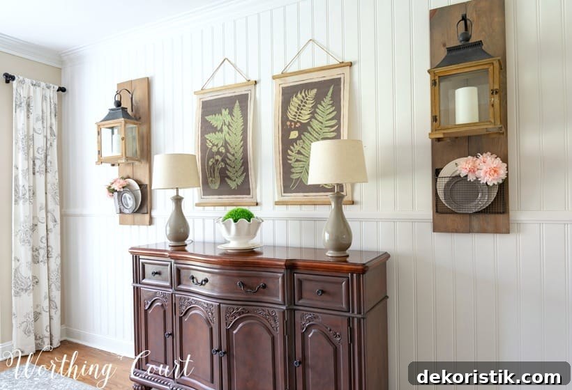 Dining room wall art above a sideboard.