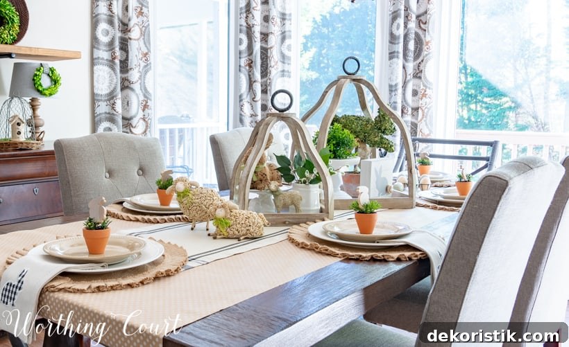 The Easter table setting with white plates and mini potted plants on the plates.