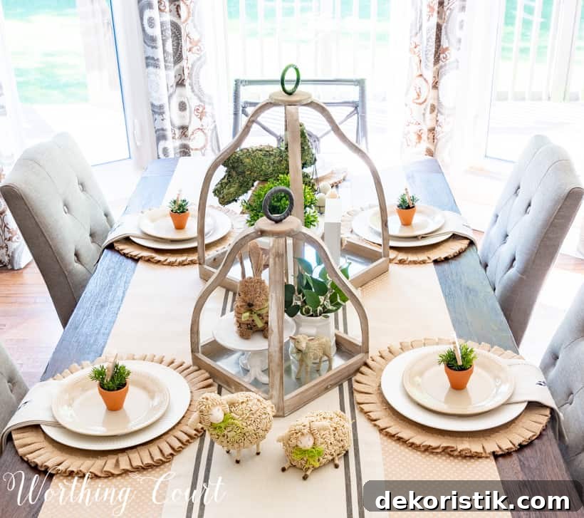 The tablescape with small sheep on the neutral table runner.