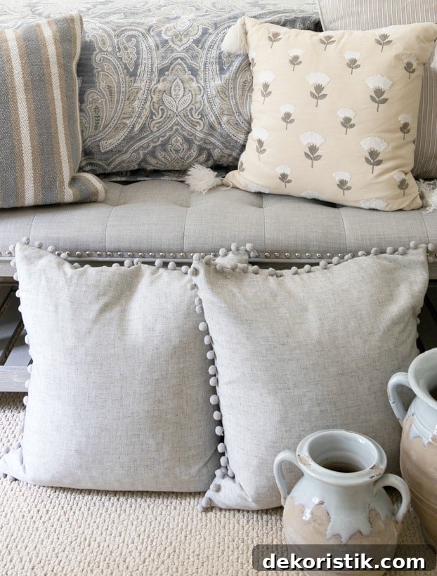 bedding and pillows in neutral colors