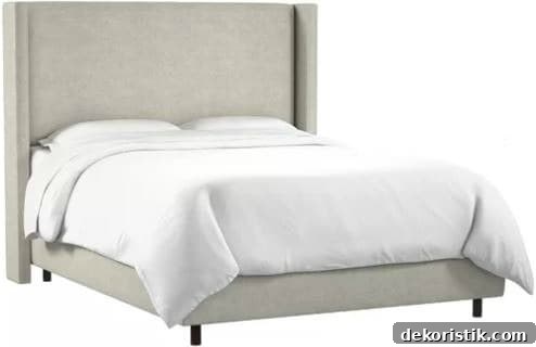 linen colored upholstered bed