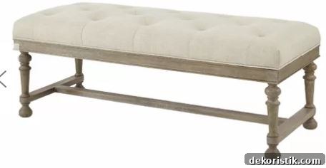 linen colored tufted bench with wood legs