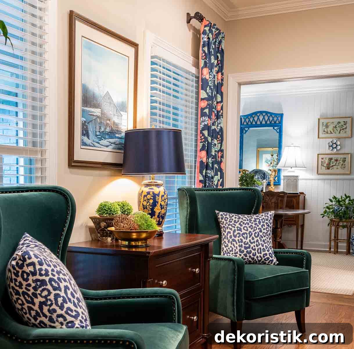 How to Choose the Right Table Lamp and Lampshade Size 8 pair of green velvet chairs positioned in front of window with navy blue floral draperies