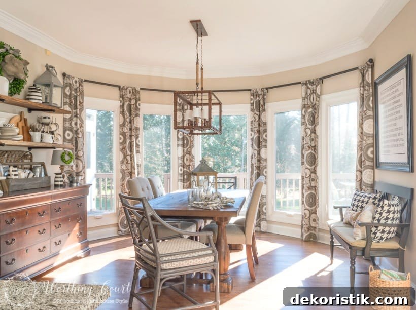 breakfast room with neutral colors and bay window