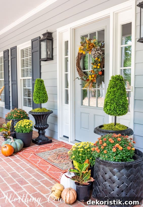 Charming Fall Front Porch Ideas with Pumpkins and Mums 2 front porch decor ideas for fall with mums, pumpkins and a fall wreath