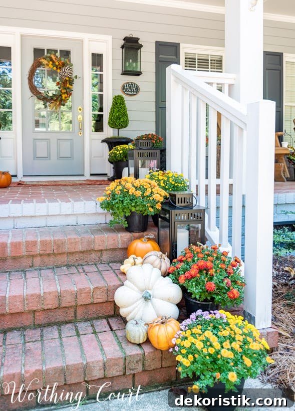 Charming Fall Front Porch Ideas with Pumpkins and Mums 6 front porch decor ideas showing mums trailing up porch steps