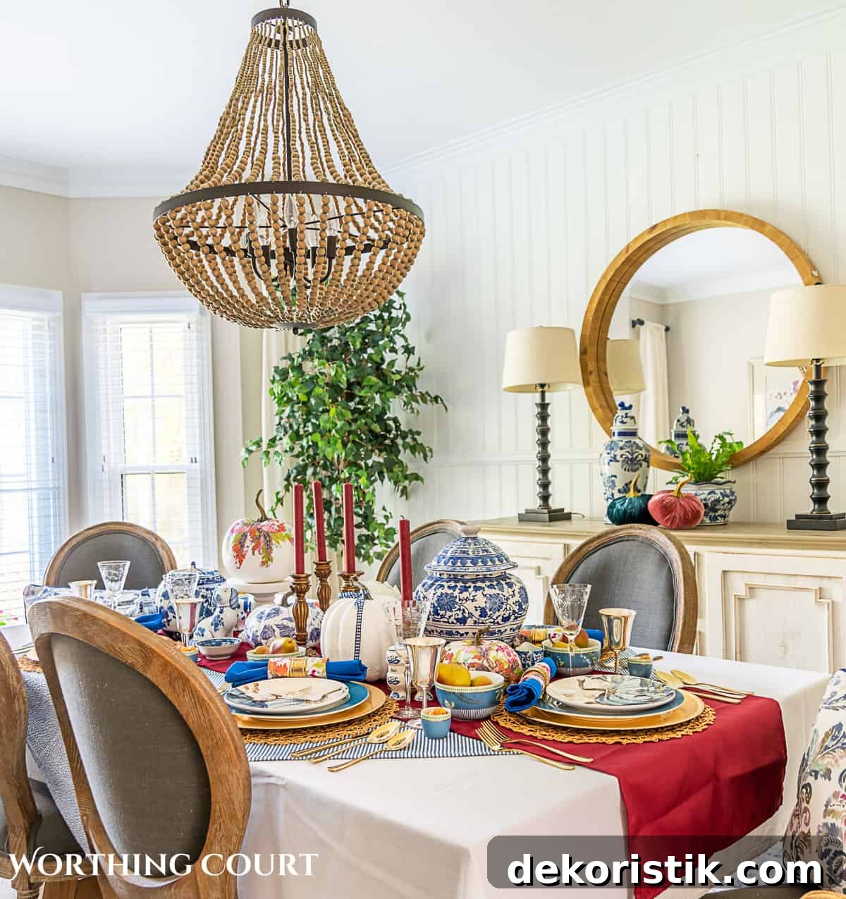 dining room table with gray chairs set for thanksgiving