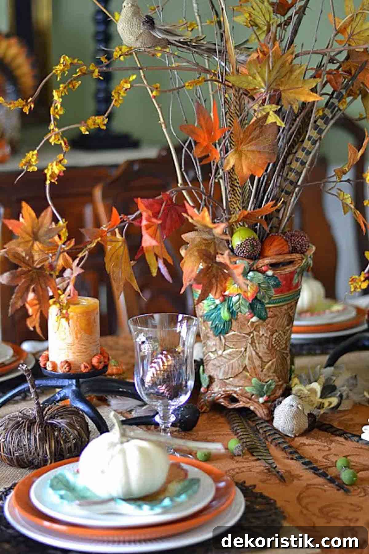 bountiful thanksgiving tablescape set with a variety of fall and traditional thanksgiving colors and elements