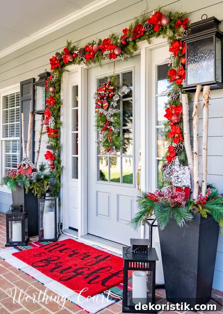 Free Printable Christmas Decorating Checklist and Timeline 7 front door decorated for Christmas with garland around the door and planters flanking the door with Christmas greenery