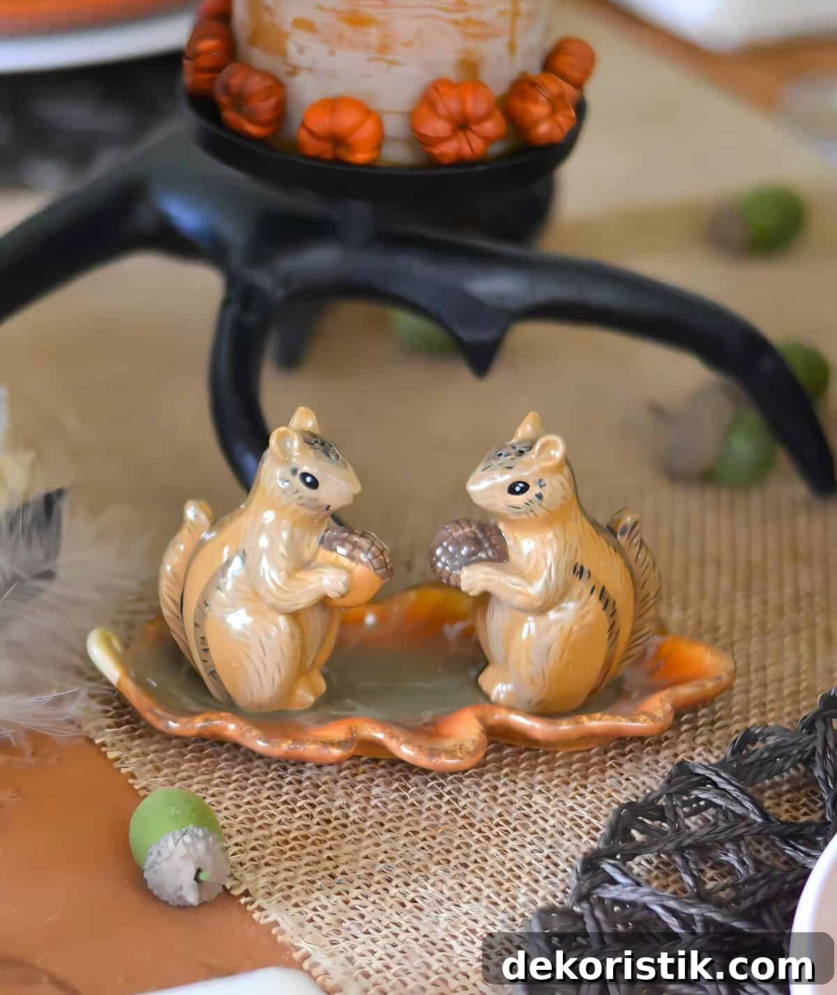 Woodland theme Thanksgiving tablescape in traditional fall colors