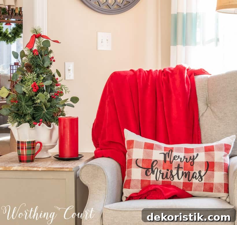 There is a red throw on the armchair.