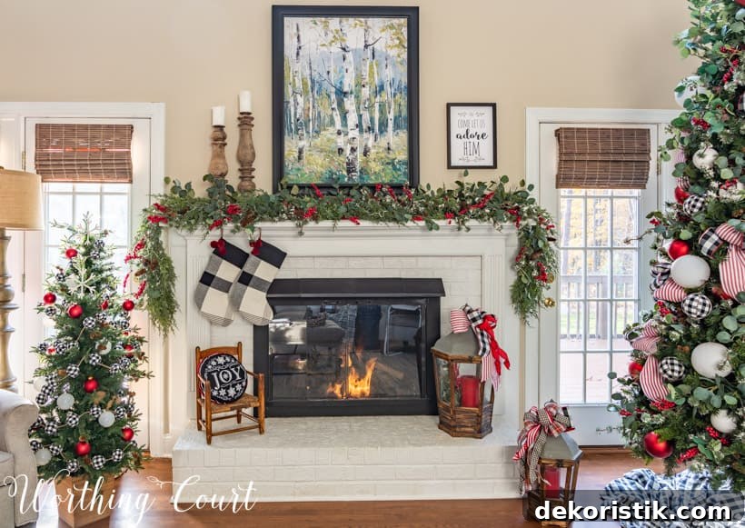 There is a large painting above the fireplace mantel.