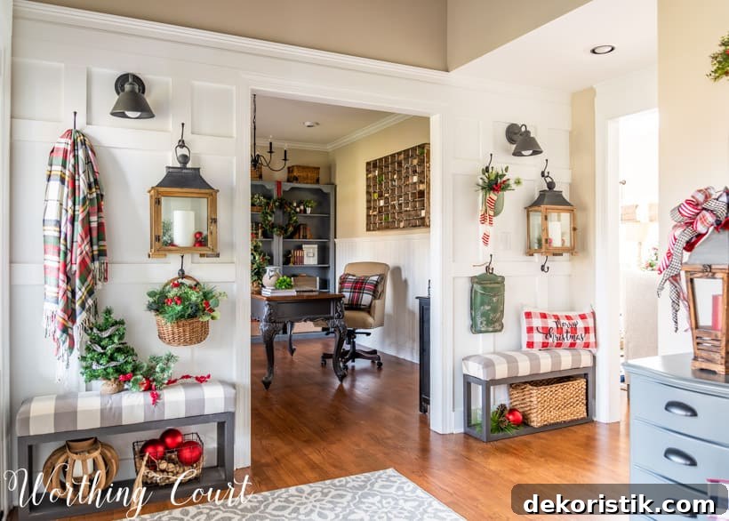 Board and batten wall with Christmas decorations hanging from the hooks.