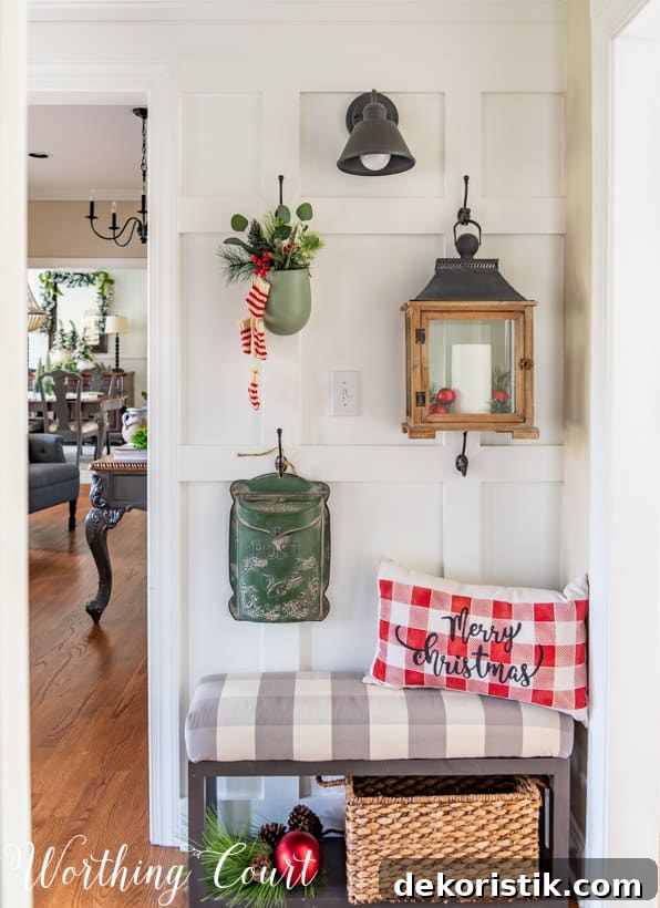 There is a plant hanging from a hook on the board and batten wall.