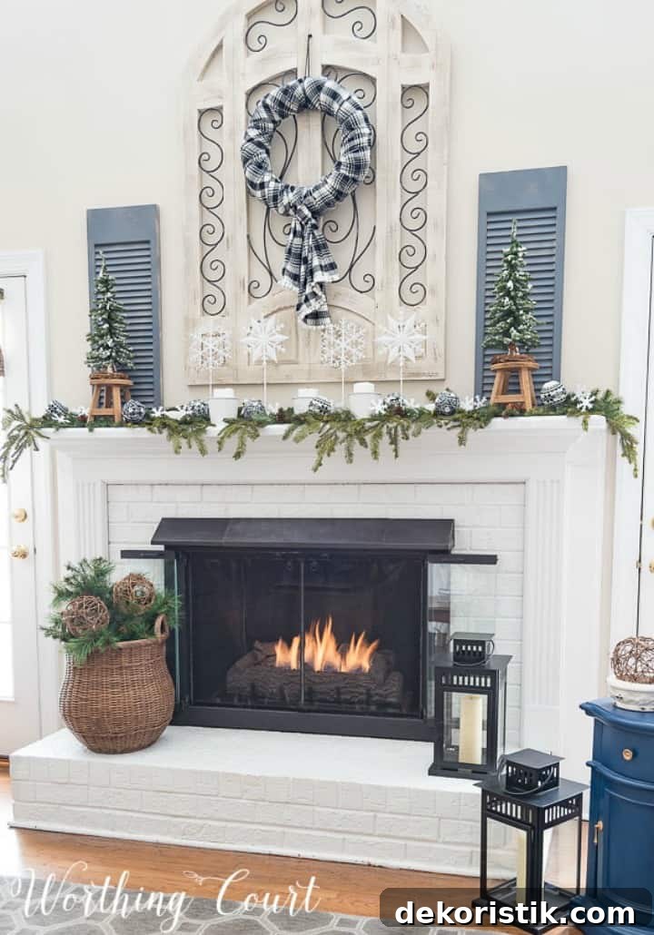 White brick fireplace decorated for winter. 