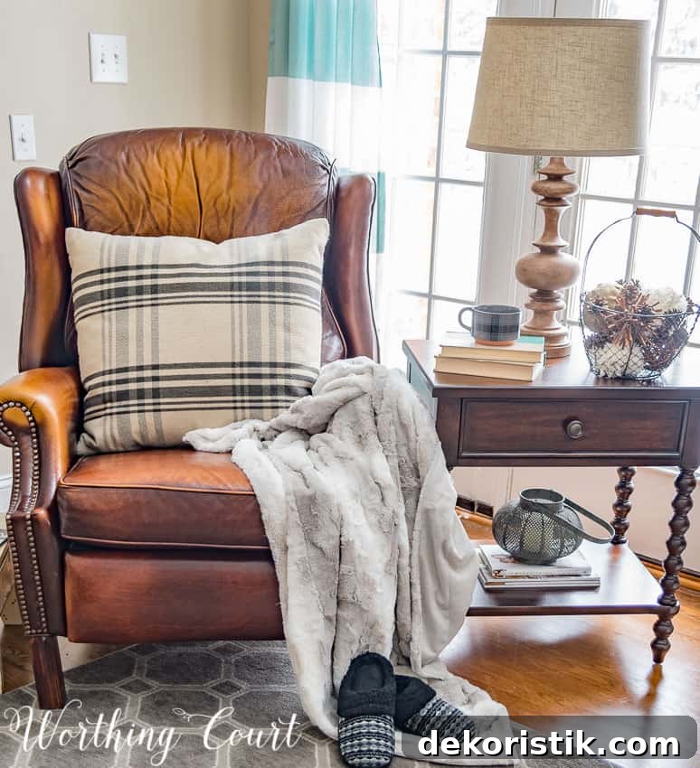 Leather recliner draped with fur throw for a cozy look.