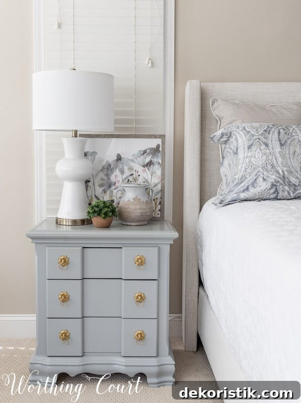 Old nightstand updated with gray paint and new hardware.