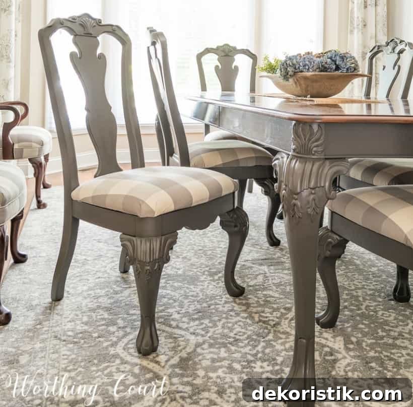 Dining room chairs painted with gray paint.