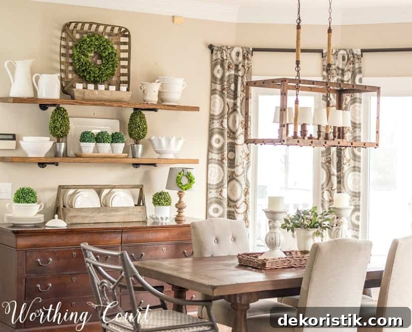 Breakfast room with table, chairs and open shelves decorated for spring.