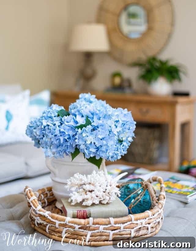 The blue flowers in a white vase in the wicker basket.