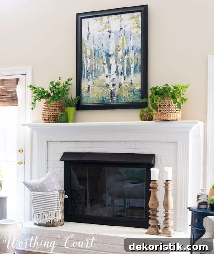 white brick fireplace with art, plants and baskets