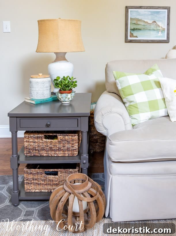 gray end table with baskets and summer accessories