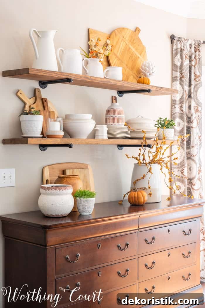 Dining area with opens shelves and fall decor