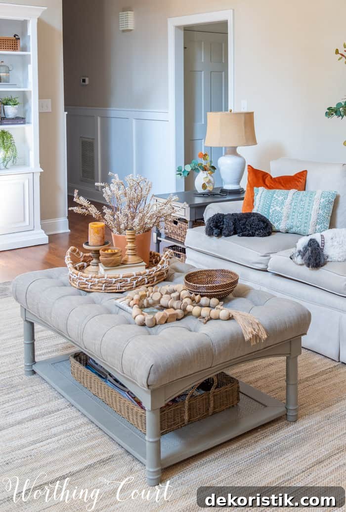 upholstered coffee table decorated for fall