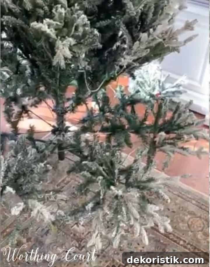 flocked artificial Christmas tree partially put together