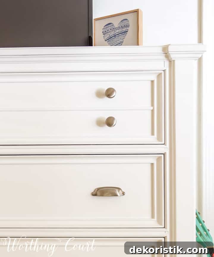 detailed view of white chest of drawers