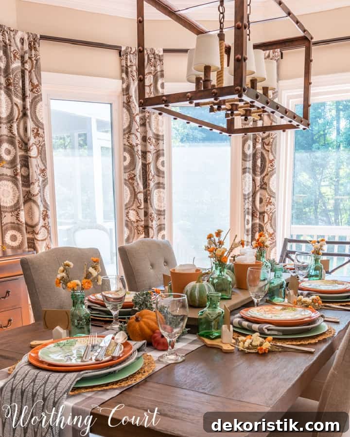 Thanksgiving table set with traditional fall colors and elements