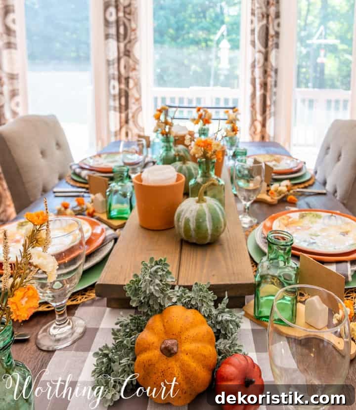 Thanksgiving table set with traditional fall colors and elements